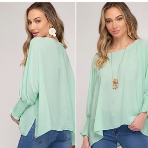 Cute mint dolman too with elastic cuffs